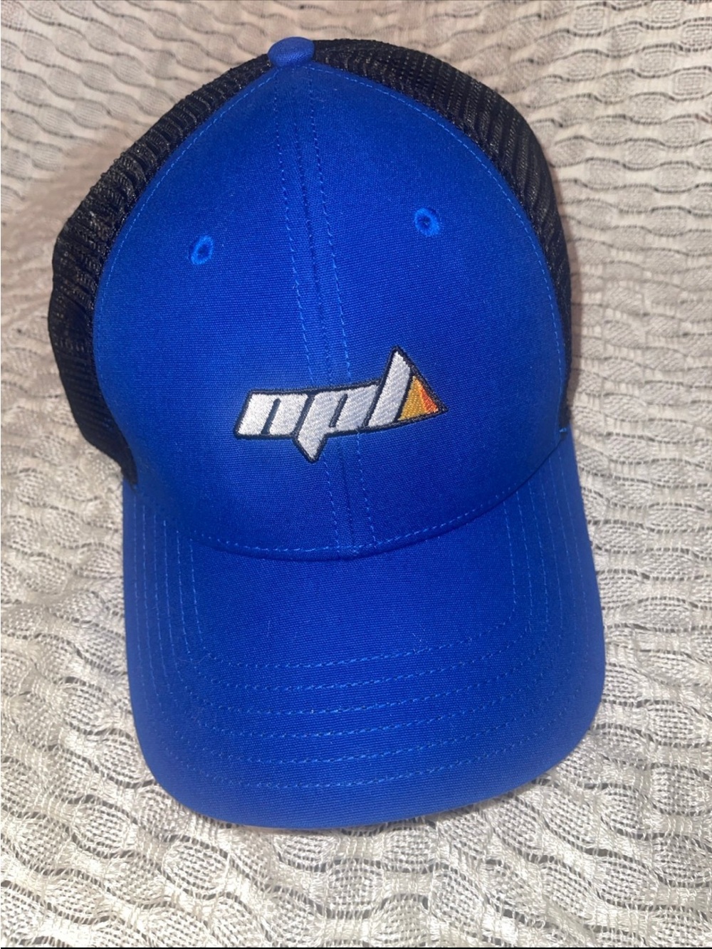 The North Face Blue and Black Mesh Logo Trucker Hat